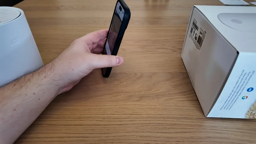 Scanning QR code on ADT box with phone