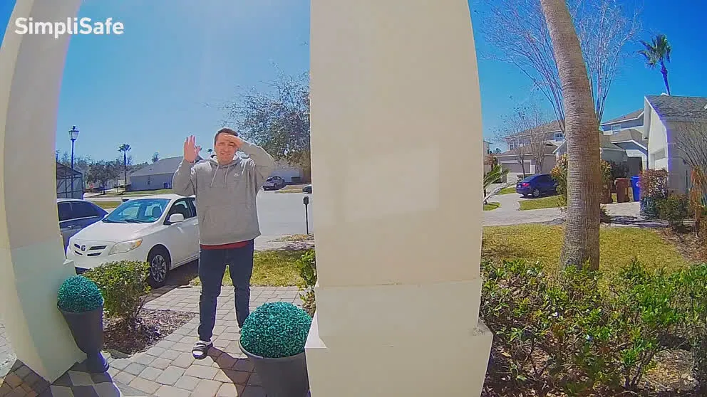 SimpliSafe doorbell camera daytime view of front porch