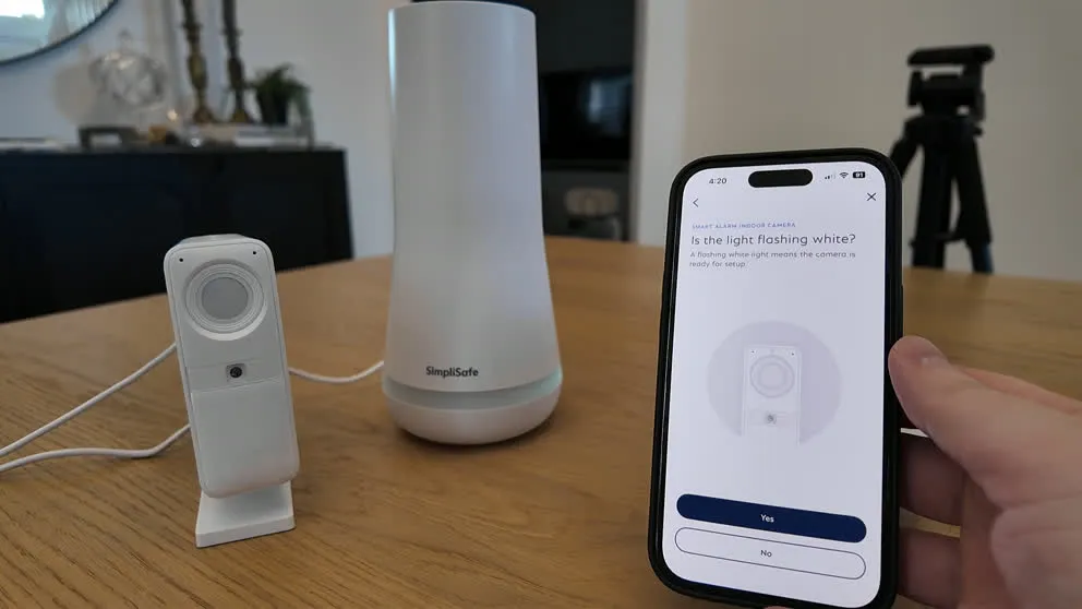 SimpliSafe indoor camera being paired through the app