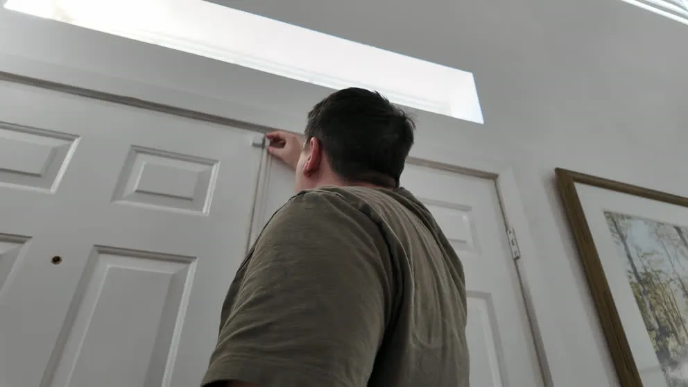 Installing a SimpliSafe entry sensor on a door