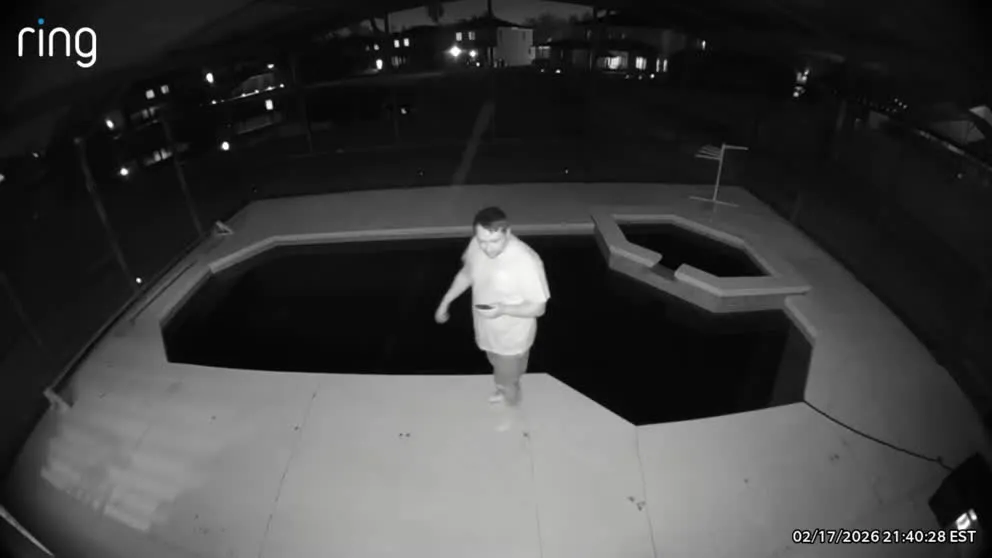 Night vision camera person by pool