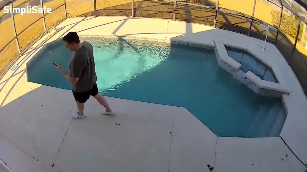 SimpliSafe outdoor camera with daytime pool area view