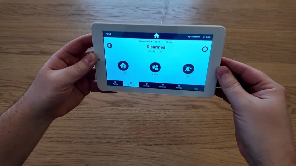 Cove touchscreen panel held in hands
