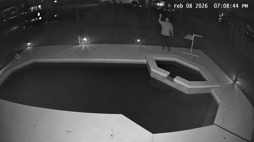 Cove outdoor camera nighttime view of pool area