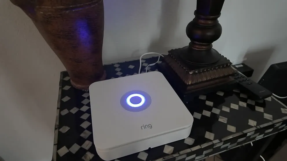 Ring Alarm base station glowing blue