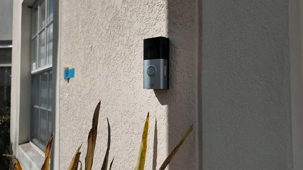 Ring video doorbell mounted on wall